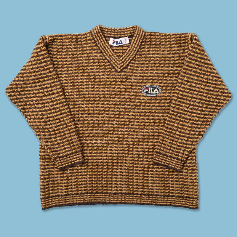 - ​​Pet toys under    yuanVintage Fila Knit V-Neck Sweater Large