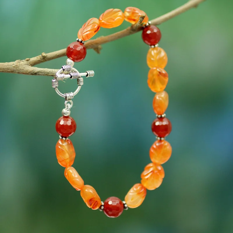 - Car dog seat beltSunset Forest Carnelian beaded bracelet